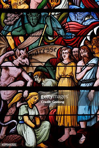 Saint Remy de Troyes church. Stained glass window by Charles-Frana§ois Champigneul . The Last Judgement. Hell and the capital sins.