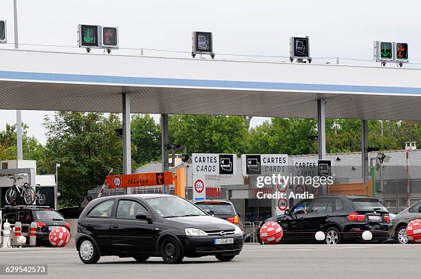 Tollgate on the A11 highway in Ancenis on during the period of heavy two-way traffic in summer. "Cofiroute" network .