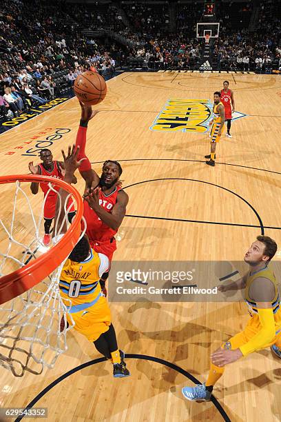 DeMarre Carroll of the Toronto Raptors goes up for a shot during a game against the Denver Nuggets on November 18, 2016 at the Pepsi Center in...