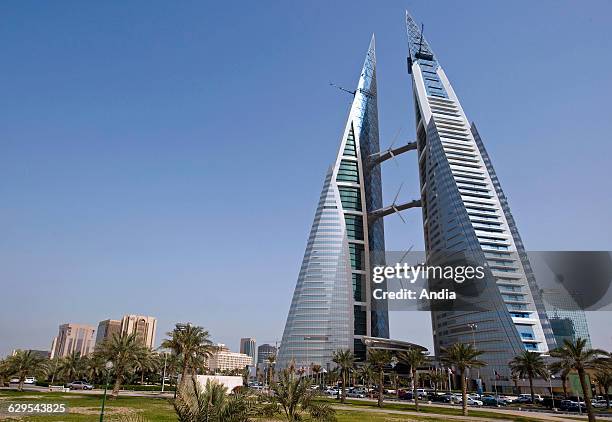 The twin towers of the World Trade Center in Manama, capital city of Bahrain in the Persian Gulf. Eco-friendly office building , eco-friendly...