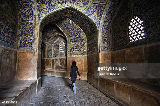 The Shah Mosque, built in the XVIIth century, standing in south side of Naghsh-i Jahan Square . The mosque is decorated with blue, yellow and green...