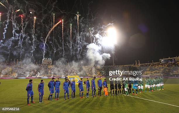 Teams line up during the Qatar Airways Cup match between FC Barcelona and Al-Ahli Saudi FC on December 13, 2016 in Doha, Qatar.