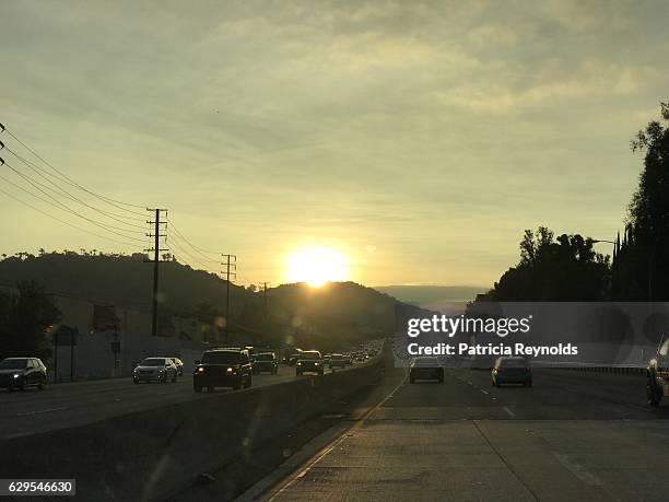 mankind and nature scene on freeway in calabasis, ca - calabasas imagens e fotografias de stock