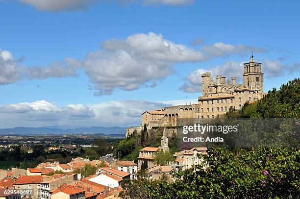 View of the city of Beziers , Beziers Cathedral overhanging the old part of the city.