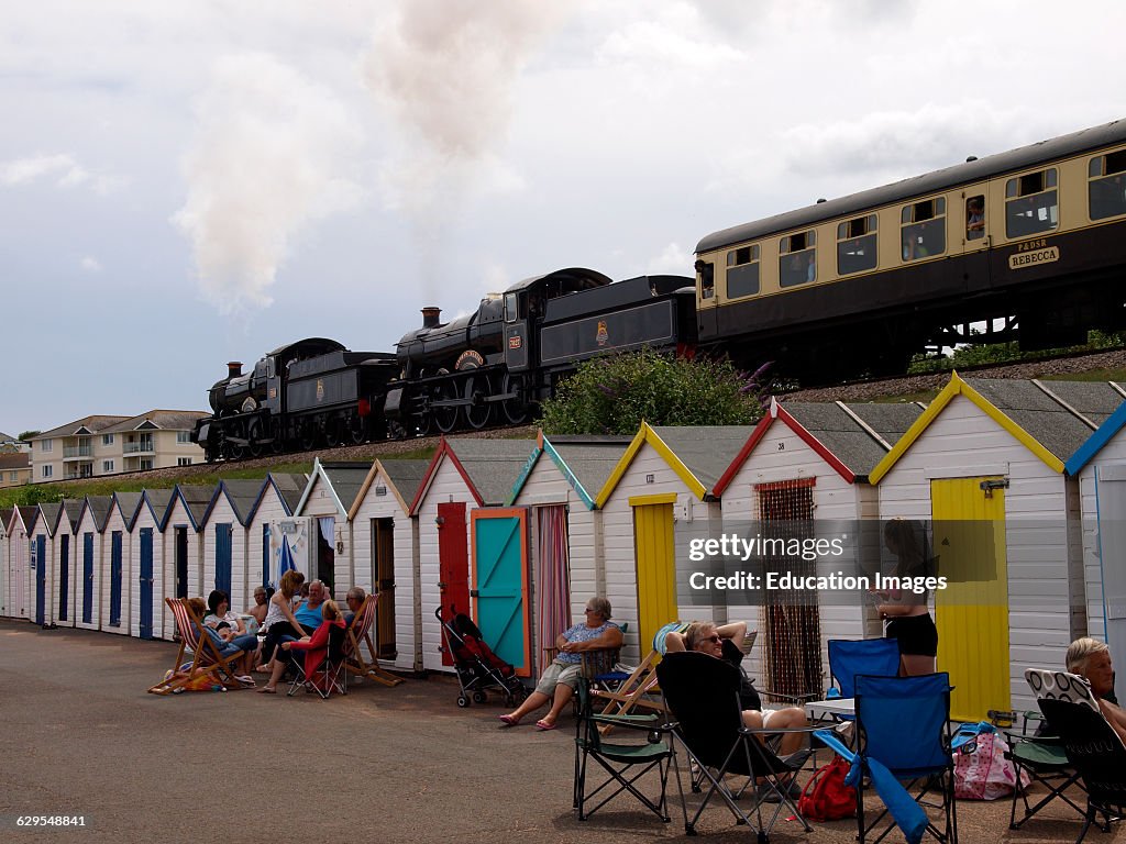 Two steam locomotives pulling together