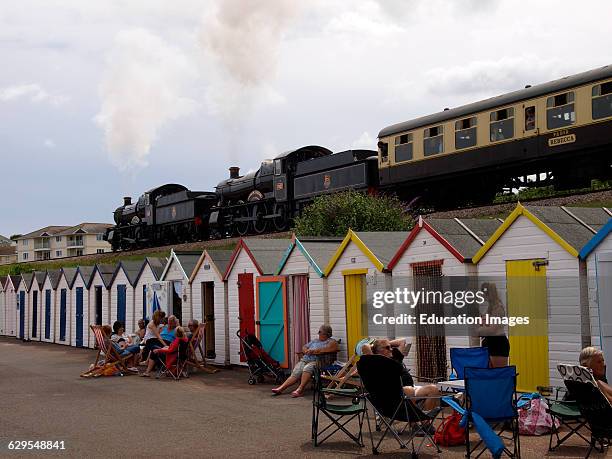 Double header, two steam locomotives pulling together on the Dartmouth Steam Railway at Goodrington Sands, Paignton, Devon, UK.