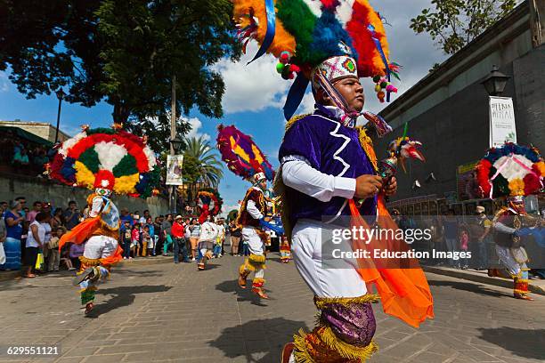 Zapotec Tribal Dancers In A Parade During The Guelaguetza Festival In July, Oaxaca, Mexico.