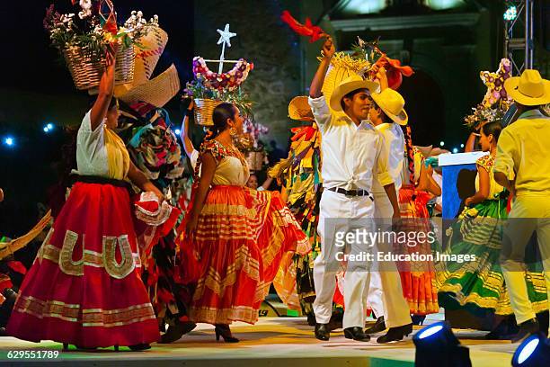 Folk Dancers Perform In The Plaza De La Danza During The Guelaguetza Festival In July, Oaxaca, Mexico.