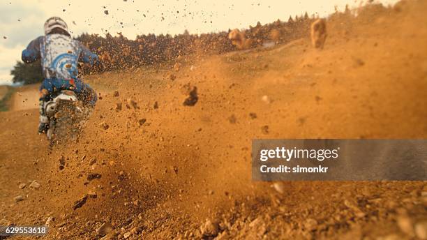 motorbike riding - dirt road stock pictures, royalty-free photos & images