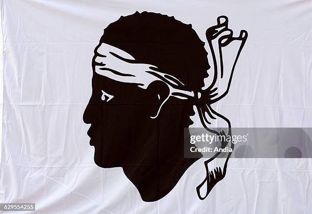 Corsican flag , Moor's head with a white headband tied round the head, on a white background.