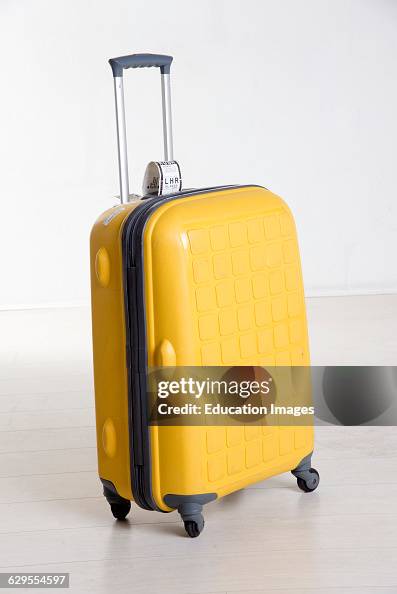 Roll along suitcase with pull handle Roll along suitcase with pull handle