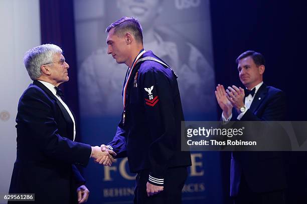 36th Chief of Staff Gen. George W. Casey, Jr. Presents the USO George Van Cleave Military Leadership Award to U.S. Navy Petty Officer 2nd Class...