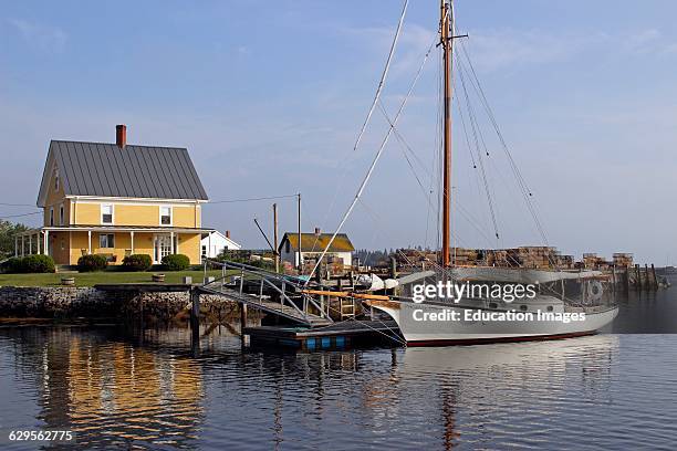 Lobster docks with sheds Vinalhaven Island Maine New England USA.