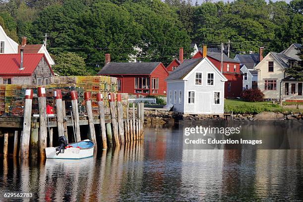 Lobster docks with sheds Vinalhaven Island Maine New England USA.