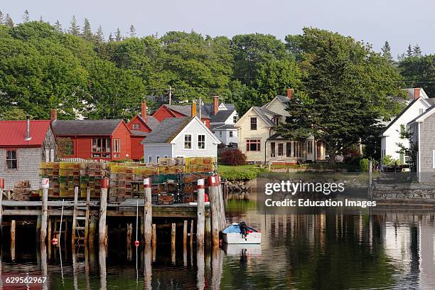 Lobster docks with sheds Vinalhaven Island Maine New England USA.