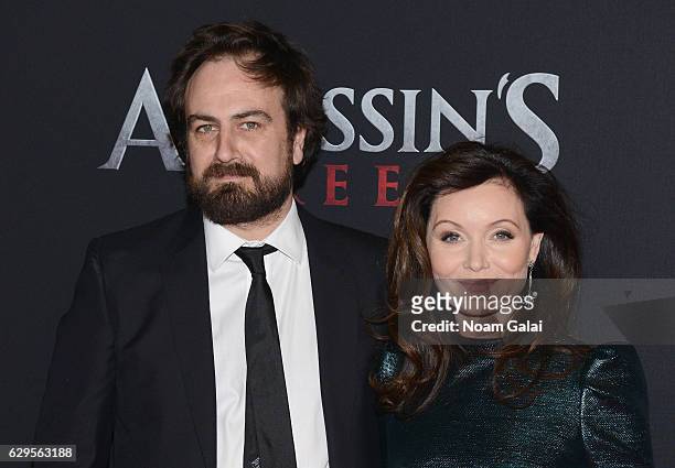 Director Justin Kurzell and Essie Davis attend the "Assassin's Creed" New York Premiere at AMC Empire 25 theater on December 13, 2016 in New York...