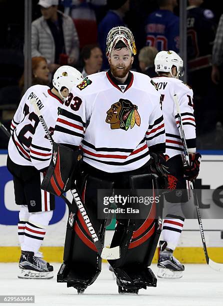 Scott Darling of the Chicago Blackhawks celebrates the wn over the New York Rangers on December 13, 2016 at Madison Square Garden in New York...