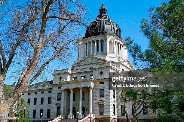 State capitol building in downtown Pierre in central South Dakota, The state capital city of South Dakota is Pierre in the center of the state on the...