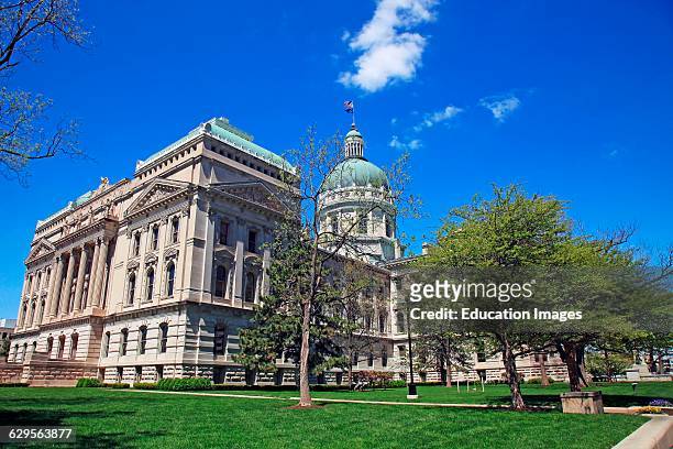 State capitol building in downtown Indianapolis Indiana on a sunny spring morning, Indianapolis is the capital city of Indiana and is located in the...