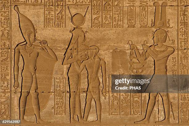 Egypt. Dendera. Temple complex. Roman Birth House of Mammisi. The Roman Emperor Trajan, depicted as a pharaoh and wearing a shuty crown, offers a...