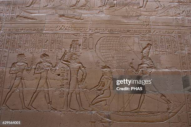Egypt. Edfu. Temple of Horus. 3rd century B.C. Relief depicting the god Horus standing on a boat and avenging his fathers murder in a battle with...