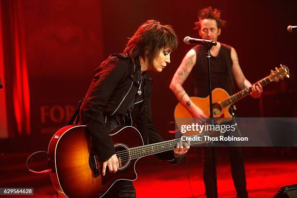 Joan Jett and the Blackhearts perform onstage during the USO 75th Anniversary Armed Forces Gala & Gold Medal Dinner at Marriott Marquis Times Square...