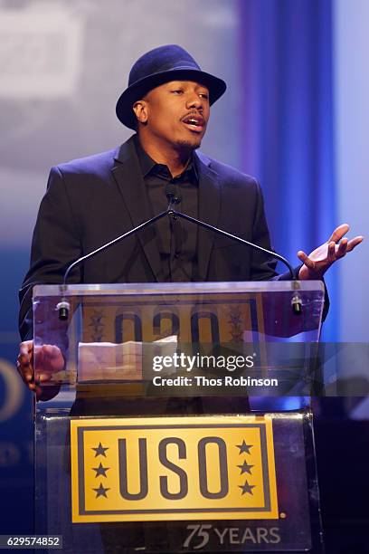 Nick Cannon speaks onstage the USO 75th Anniversary Armed Forces Gala & Gold Medal Dinner at Marriott Marquis Times Square on December 13, 2016 in...