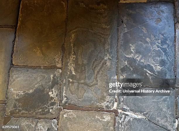 Stone floor inside Anne Hathaway's Cottage, where Anne Hathaway, the wife of William Shakespeare, lived as a child. Stratford-upon-Avon, England. The...