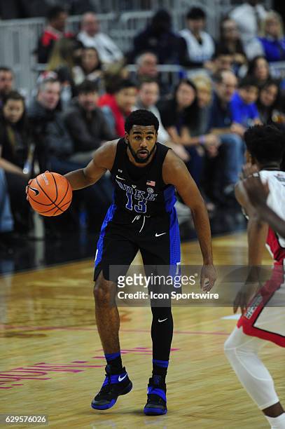 Duke Blue Devils guard Matt Jones dribbles the ball up-court against the UNLV Rebels in the first half of their NCAA college basketball game on...