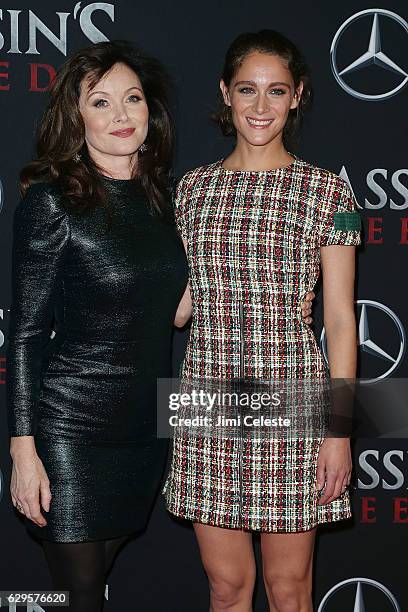 Actress Essie Davis and Ariane Labed attends the "Assassin's Creed" New York Premiere at AMC Empire 25 theater on December 13, 2016 in New York City.