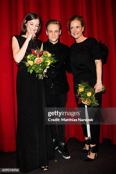 Claudia Michelsen, Matthias Schweighofer and Alexandra Maria Lara attend the German premiere of the film 'Vier gegen die Bank' at CineStar on...