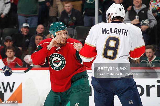 Chris Stewart of the Minnesota Wild and Dylan McIlrath of the Florida Panthers fight during the game on December 13, 2016 at the Xcel Energy Center...