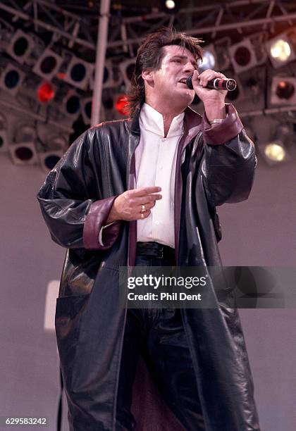 Tony Hadley of Spandau Ballet performs on stage at Live Aid, Wembley Stadium, London, 13th July 1985.