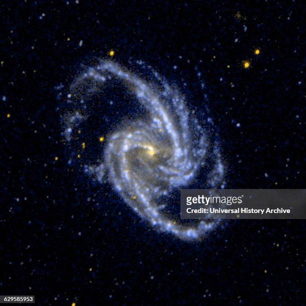 Ultraviolet image of the barred spiral galaxy NGC 1365, which is a member of the Fornax Cluster of Galaxies. Dated 2005