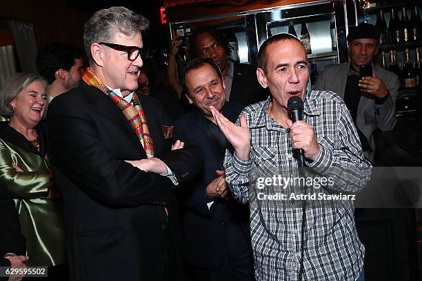 Jonathan Freeman and Gilbert Gottfried speak during a cocktail party in celebration of "Life, Animated" at Megu New York on December 13, 2016 in New...