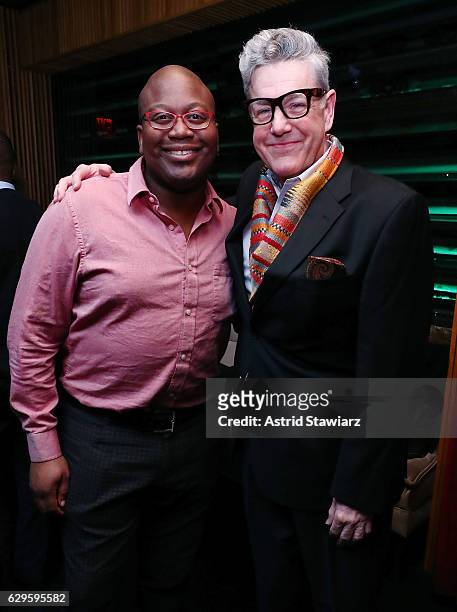 Tituss Burgess and Jonathan Freeman attend a cocktail party in celebration of "Life, Animated" at Megu New York on December 13, 2016 in New York City.