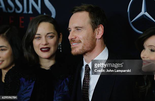 Marion Cotillard and Michael Fassbender attend "Assassin's Creed" New York premiere at AMC Empire 25 theater on December 13, 2016 in New York City.