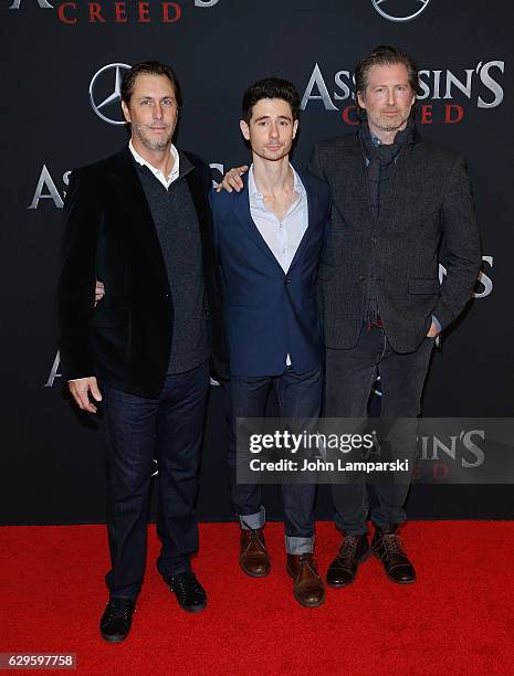 Writers, Bill Collage, Mike Lesslie and Adam Cooper attend "Assassin's Creed" New York premiere at AMC Empire 25 theater on December 13, 2016 in New...