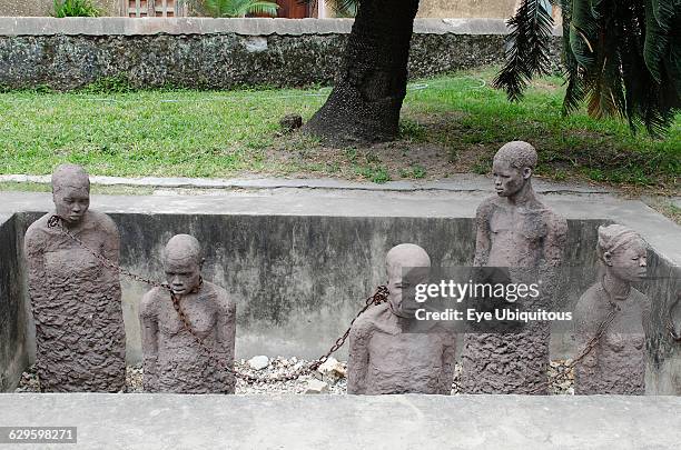 Tanzania, Zanzibar, Stone Town, Sculpture entitled Memory for the Slaves at the former slave market.