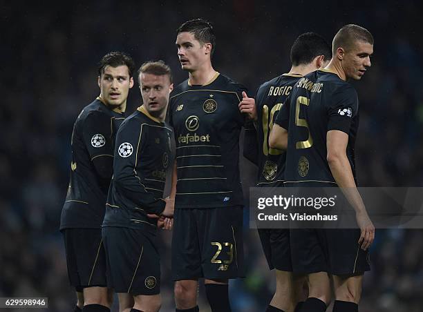 Mikael Lustig of Celtic directs the wall during the UEFA Champions League match between Manchester City FC and Celtic FC at Etihad Stadium on...