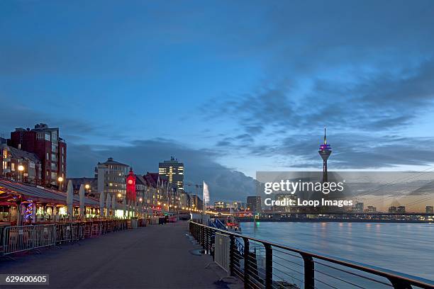 View along the promenade towards the TV tower in Dusseldorf, Dusseldorf, Germany.