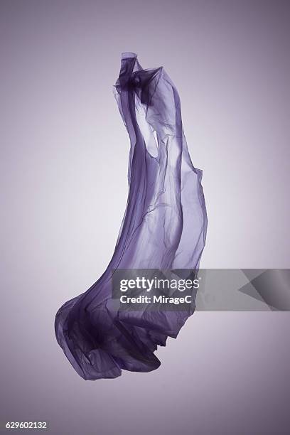 eggplant shape purple plastic bag - plastic bag stock-fotos und bilder