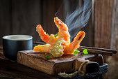 Delicious shrimp in tempura with sweet and sour sauce