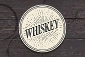 Beverage coaster for glass with inscription Whiskey