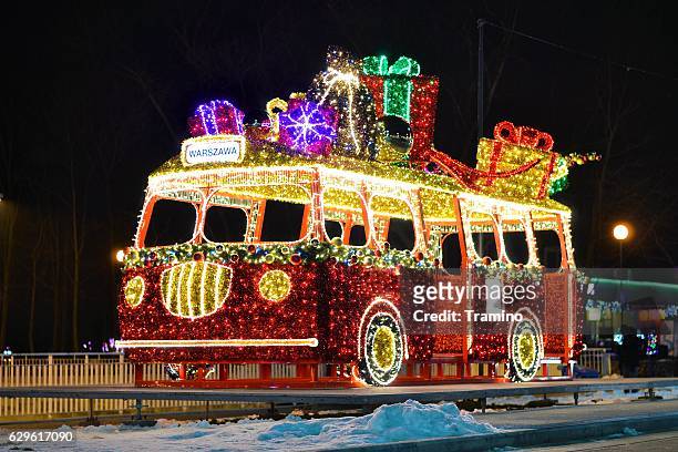 christmas lights on the classic bus model - warsaw bus stock pictures, royalty-free photos & images