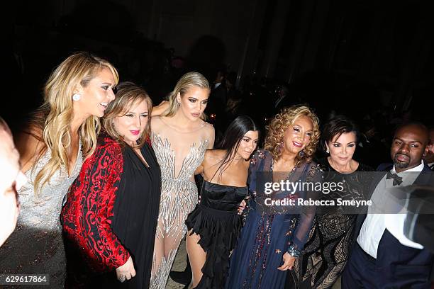 Ofira Sandberg, Lorraine Schwartz, Khloe Kardashian, Kourtney Kardashian, Denise Rich, Kris Jenner, and Corey Gamble attend the Angel Ball 2016 at...