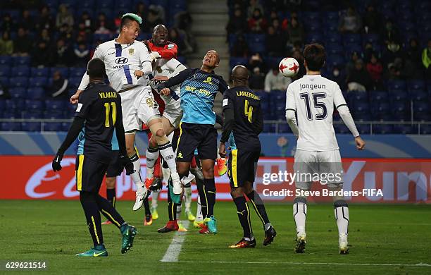 Kim Shinwook of Jeonbuk Hyundai scores his side's fourth goal with a header during the FIFA Club World Cup 5th Place match between Jeonbuk Hyundai...