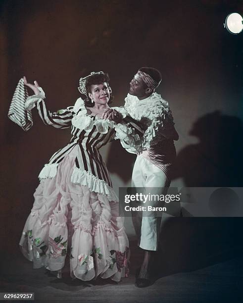 American ballet dancers Katherine Dunham and Vanoye Aikens in Dunham's ballet 'L'Ag' Ya' at the Prince of Wales Theatre in London, 1948.