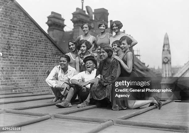 Cast members of Lew Leslie's musical revue, 'Blackbirds Of 1926', on the roof of the London Pavilion, 1926. Front row : Florence Mills , Johnny...