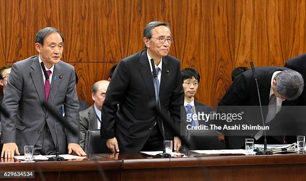 Hiroyuki Hosoda chairman of the ruling Liberal Democratic Party's General Council, bows after the casino bill passed the Upper House Committee at the...
